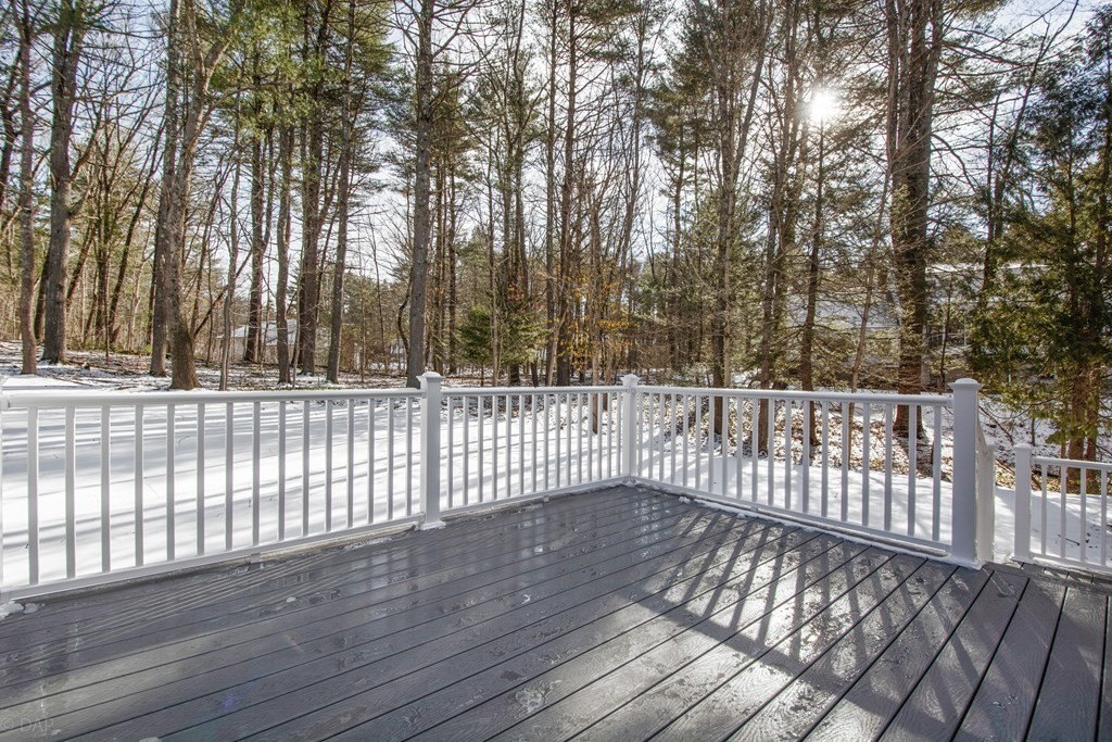 143 Hillcrest Road Concord, MA 01742 - Photo 37 of 42 a view of a balcony with wooden fence and floor