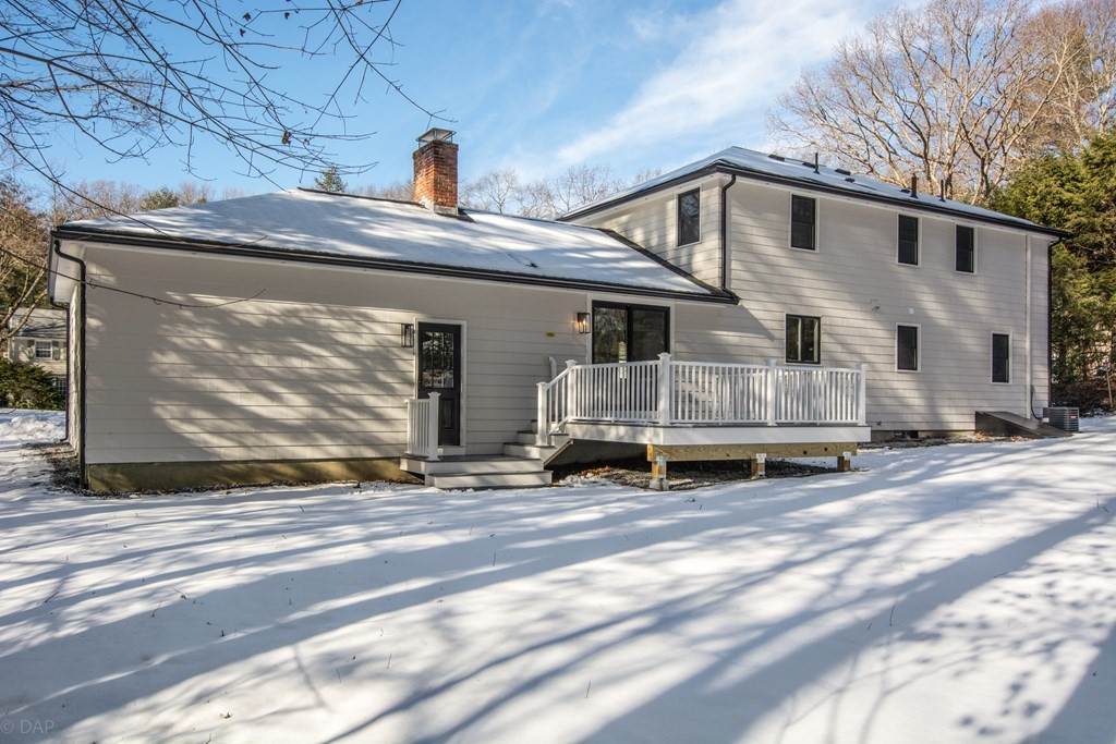 143 Hillcrest Road Concord, MA 01742 - Photo 40 of 42 a view of a house with a yard