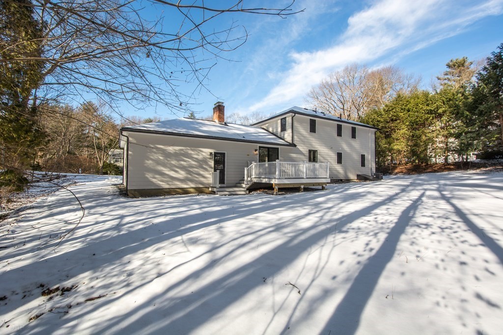143 Hillcrest Road Concord, MA 01742 - Photo 41 of 42 a front view of a house with a yard