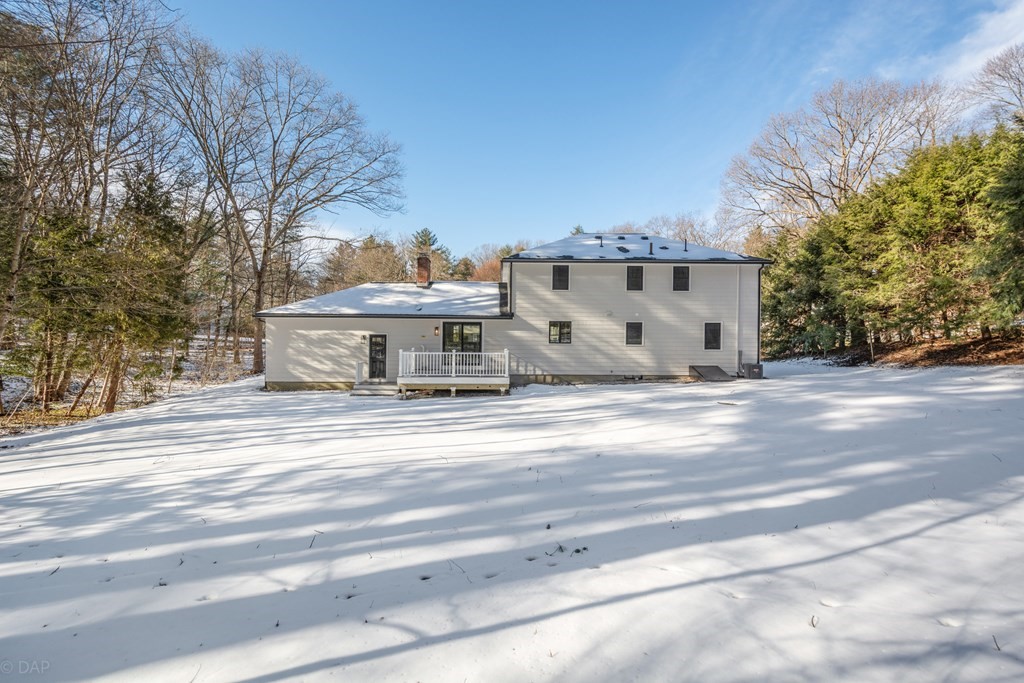 143 Hillcrest Road Concord, MA 01742 - Photo 42 of 42 a view of a house with a sink and trees