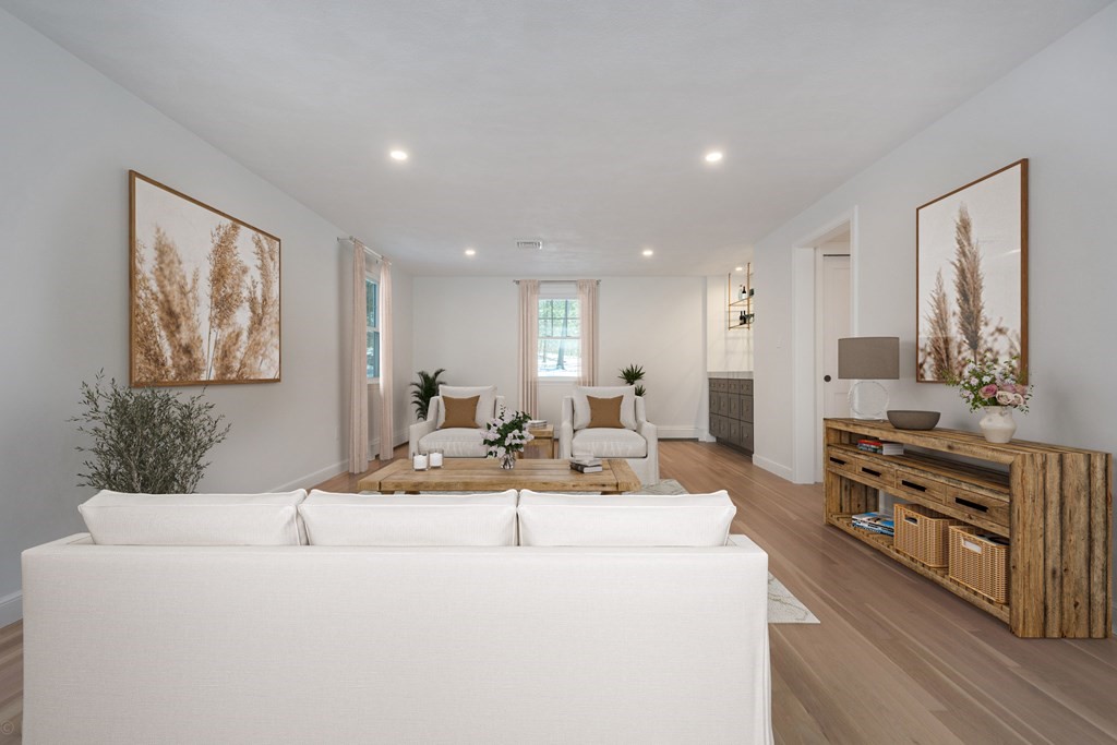 143 Hillcrest Road Concord, MA 01742 - Photo 6 of 42 a living room with stainless steel appliances kitchen island furniture and a table