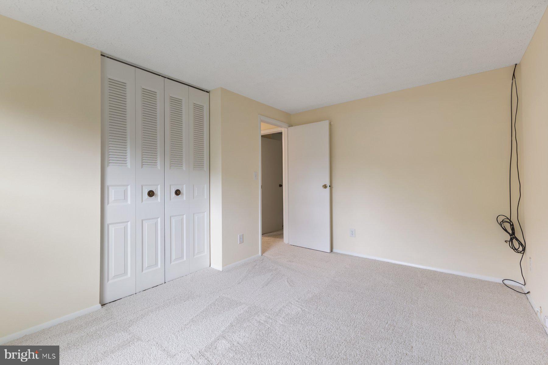 8011 Treasure Tree Court Springfield, VA 22153 - Photo 19 of 31 a view of an empty room