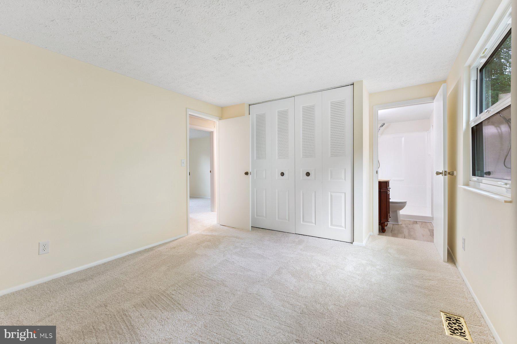 8011 Treasure Tree Court Springfield, VA 22153 - Photo 21 of 31 a view of empty room with a fireplace