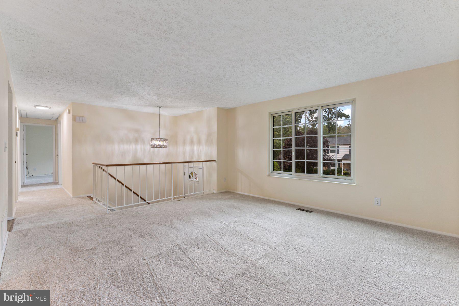 8011 Treasure Tree Court Springfield, VA 22153 - Photo 29 of 31 a view of an empty room with a window