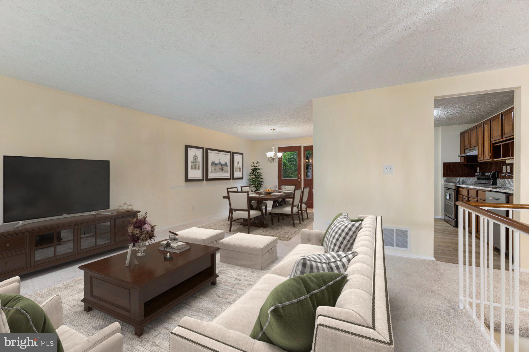 8011 Treasure Tree Court Springfield, VA 22153 - Photo 3 of 31 a living room with furniture and a flat screen tv
