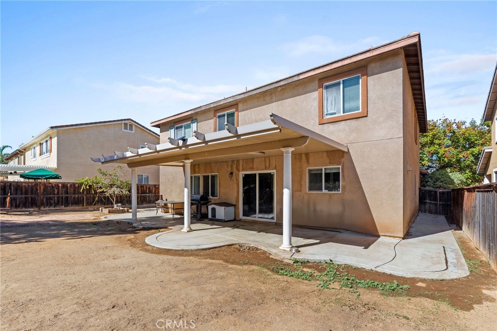 29225 Hydrangea Street Murrieta, CA 92563 - Photo 30 of 38 a front view of a house with garden