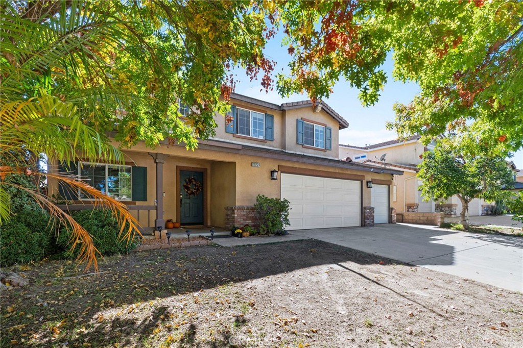 29225 Hydrangea Street Murrieta, CA 92563 - Photo 37 of 38 a front view of a house with garden