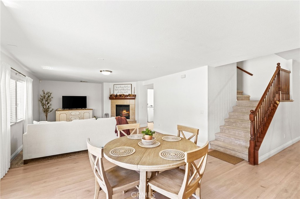 29225 Hydrangea Street Murrieta, CA 92563 - Photo 9 of 38 a living room with furniture and a flat screen tv
