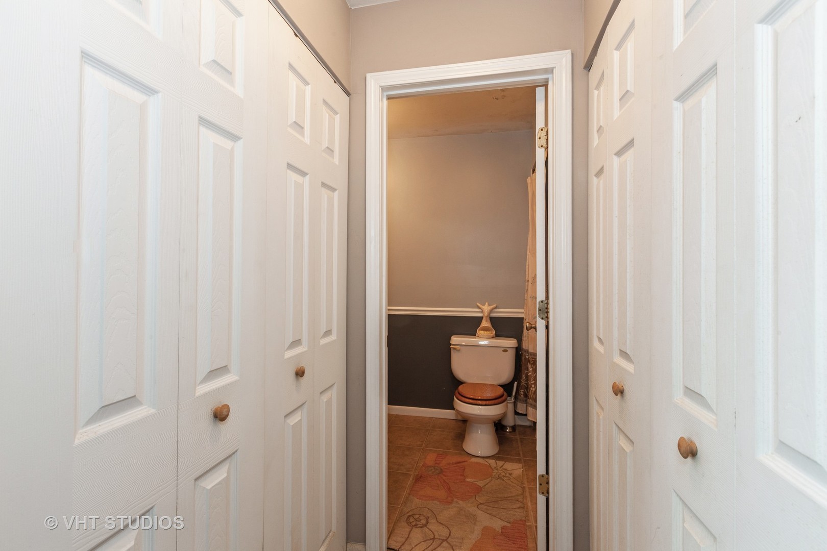 3026 Roberts Drive, Unit 4 Woodridge, IL 60517 - Photo 11 of 19 a bathroom with a granite countertop toilet and a sink
