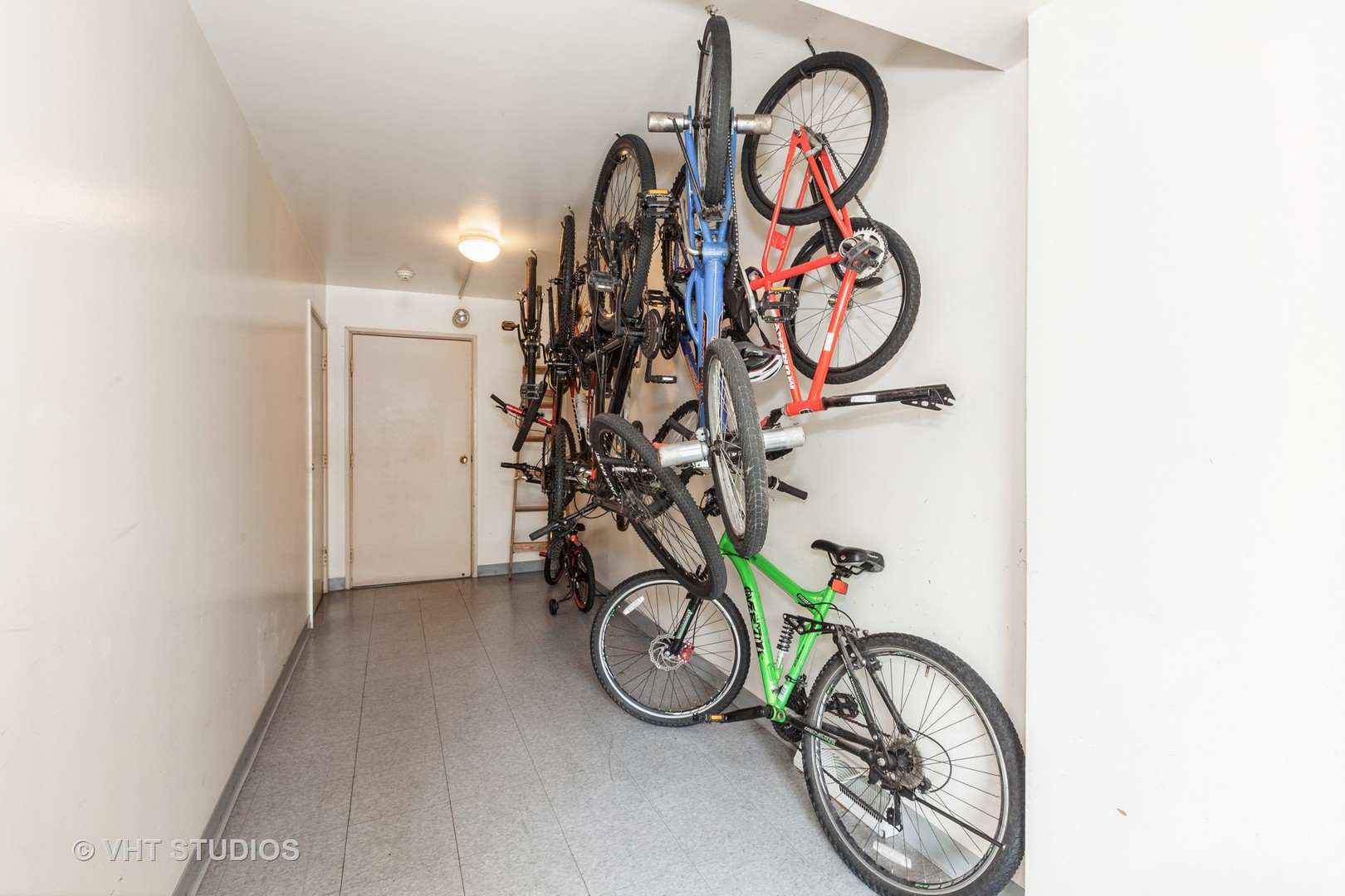 3026 Roberts Drive, Unit 4 Woodridge, IL 60517 - Photo 14 of 19 a view of a bike storage next to a wall