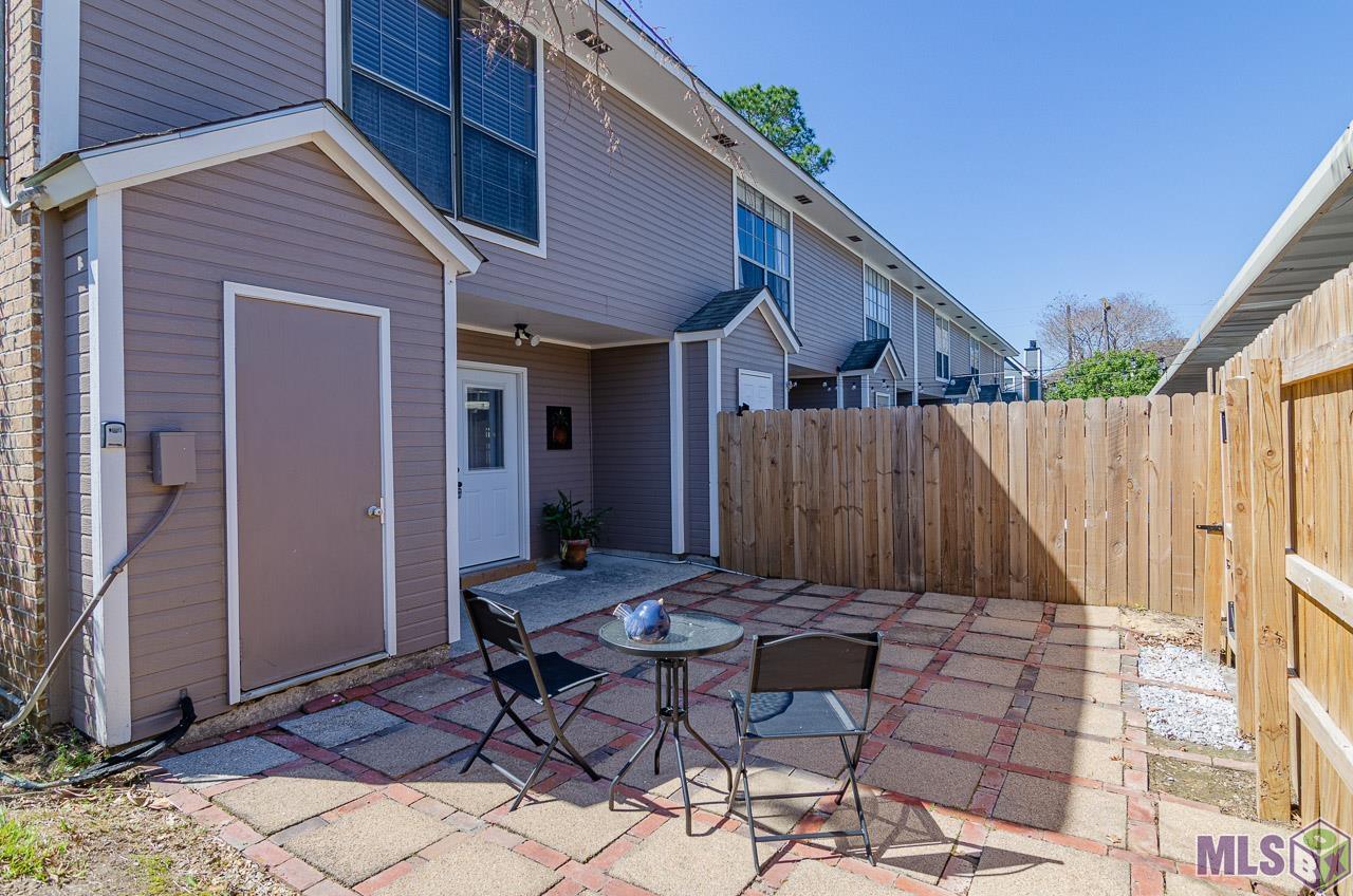 11 Brent Court Baton Rouge, LA 70808 - Photo 2 of 11 Back Entrance from Covered Carport