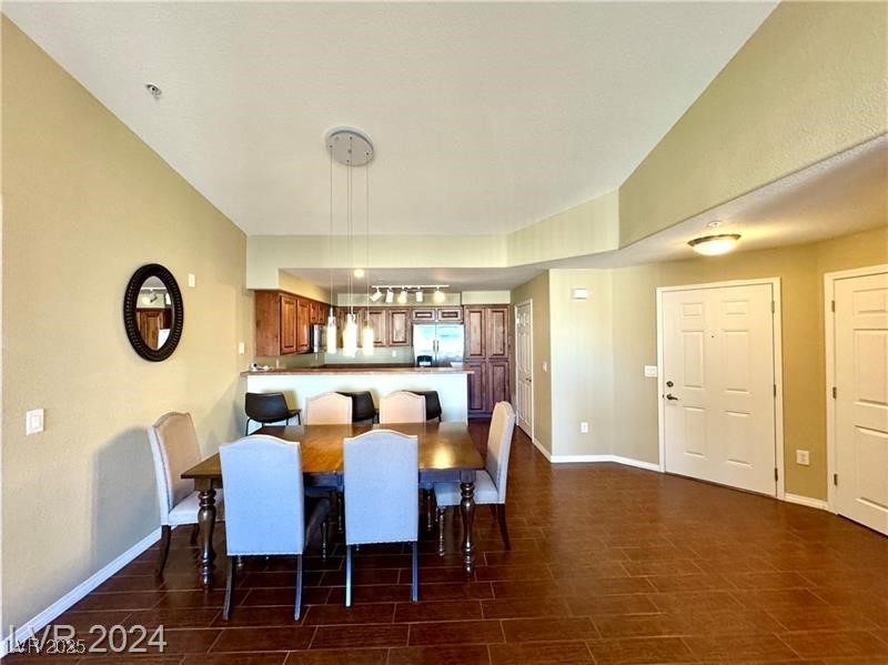8777 West Maule Avenue, Unit 2103 Las Vegas, NV 89148 - Photo 5 of 33 Dining area with wood finish floors
