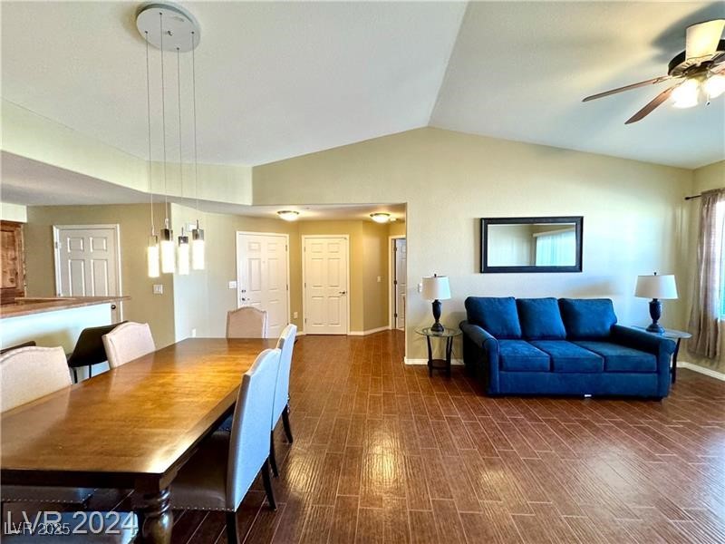 8777 West Maule Avenue, Unit 2103 Las Vegas, NV 89148 - Photo 8 of 33 Dining room featuring lofted ceiling and a ceiling fan