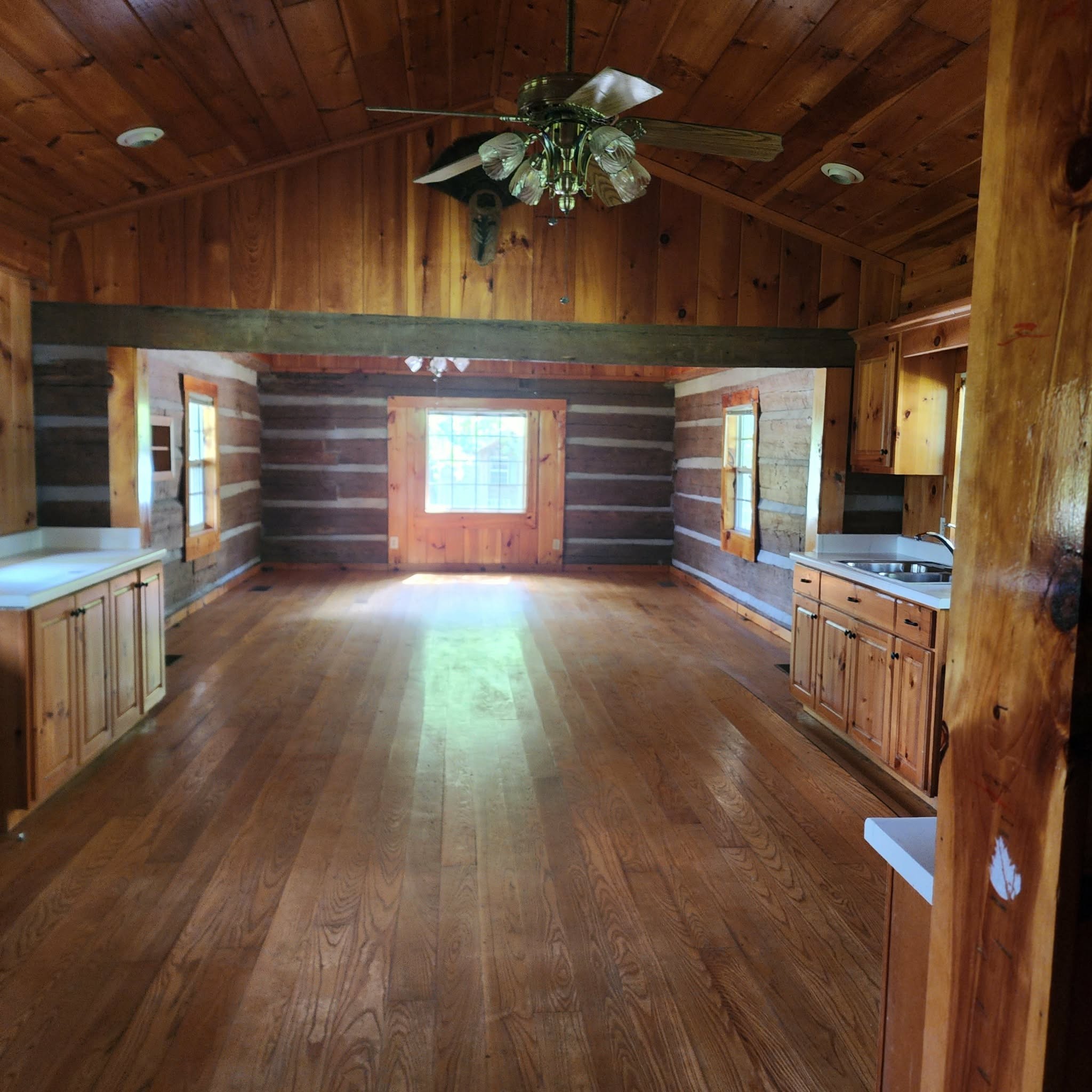 145 Mrs Gower Road Lawrenceburg, TN 38464 - Photo 22 of 26 a kitchen with stainless steel appliances a stove and a wooden floor