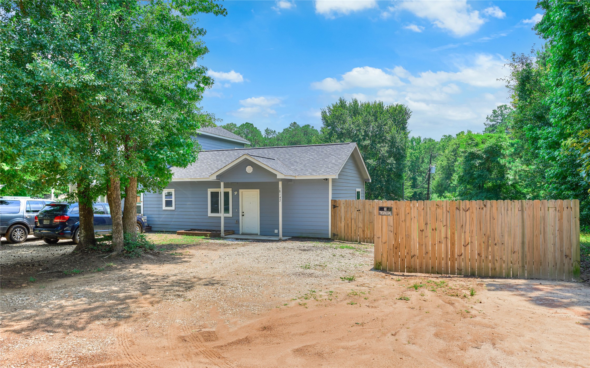 18147 Firepine Lane Montgomery, TX 77316 - Photo 1 of 25 a view of a house with a yard