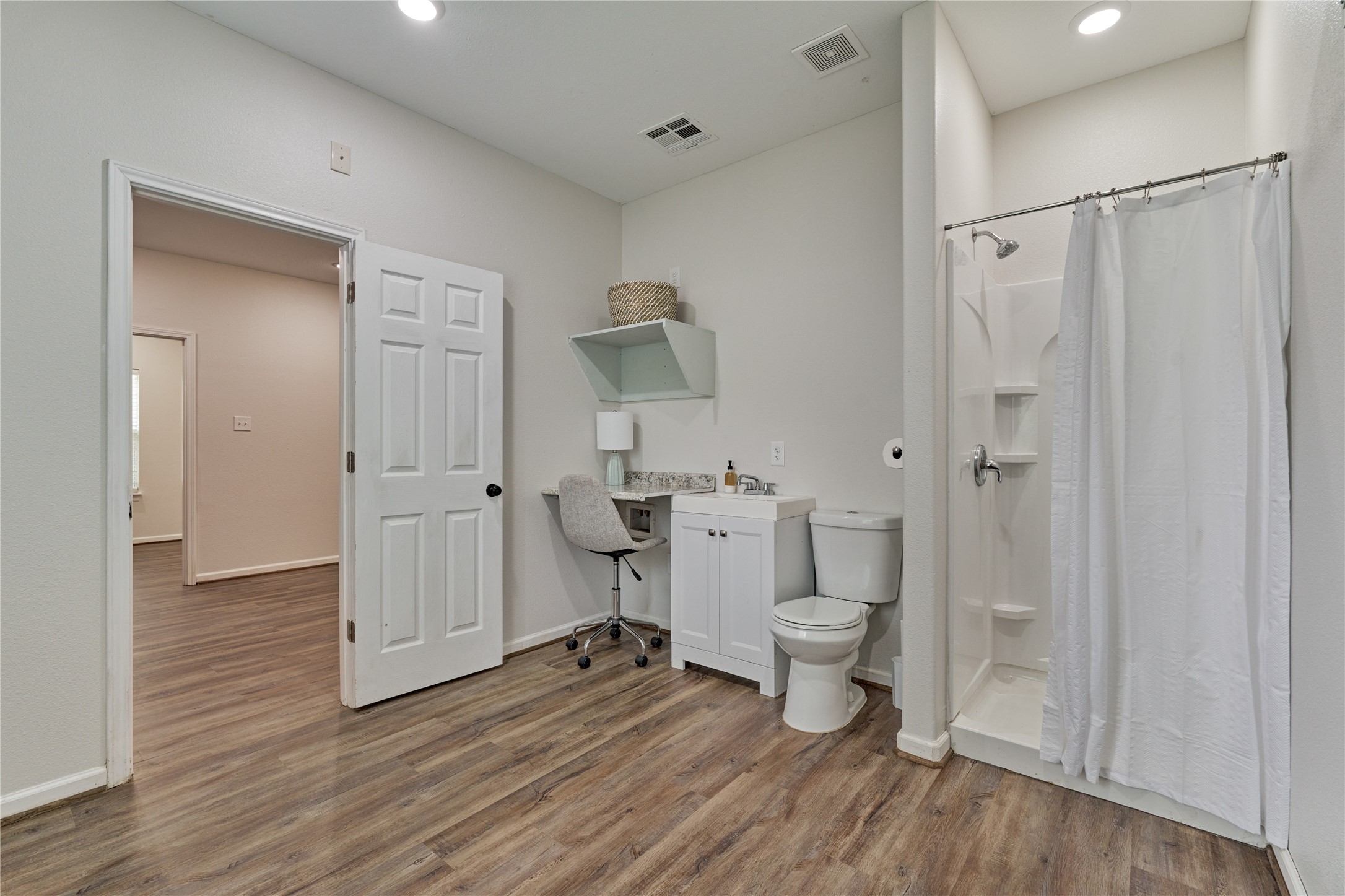 18147 Firepine Lane Montgomery, TX 77316 - Photo 14 of 25 a bathroom with a toilet and a shower