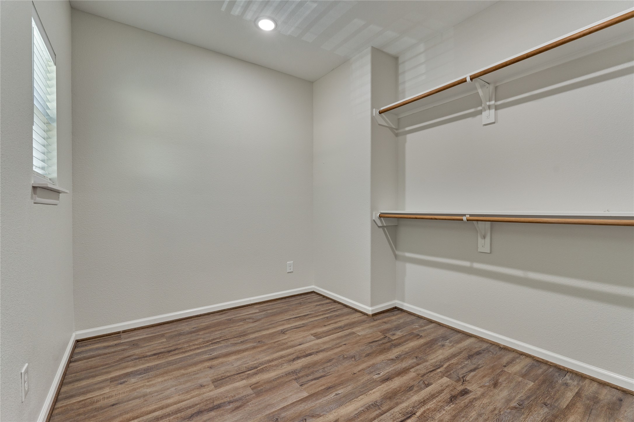 18147 Firepine Lane Montgomery, TX 77316 - Photo 20 of 25 a view of an empty room with wooden floor and closet
