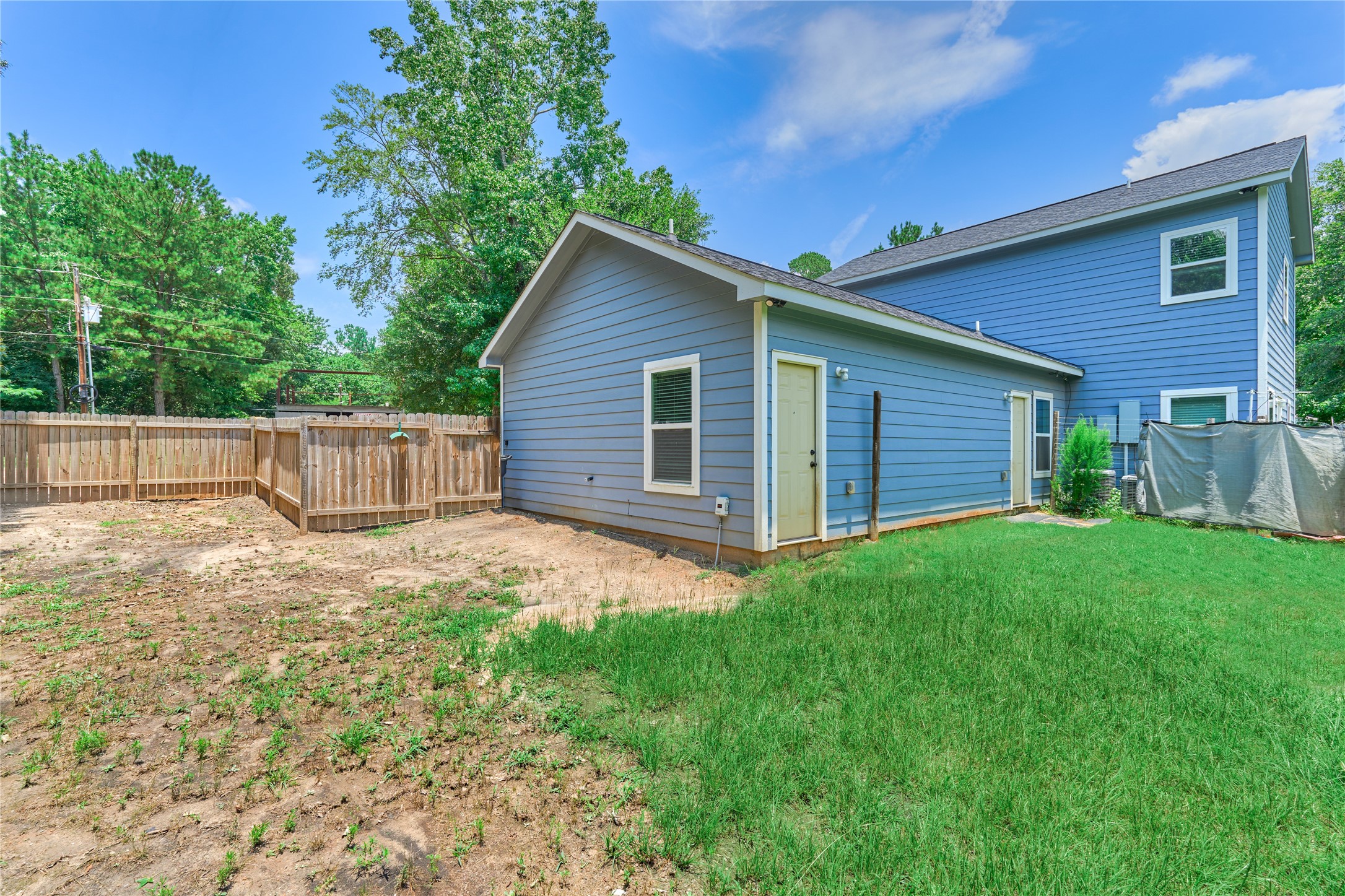 18147 Firepine Lane Montgomery, TX 77316 - Photo 24 of 25 a view of backyard of house with wooden fence