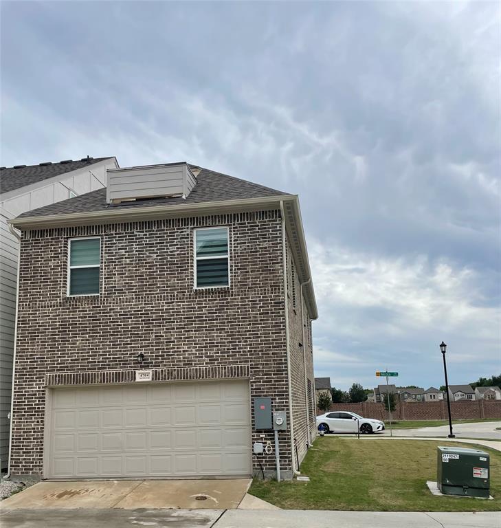 4704 Craymore Road Dallas, TX 75228 - Photo 11 of 14 a front view of a house with a garden