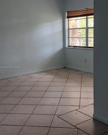 a view of a room and window