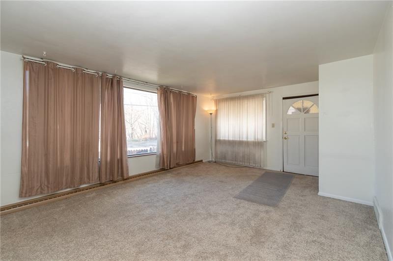 590 Jefferson Street Rochester, PA 15074 - Photo 2 of 15 Really nice size living room - big enough for family, friends & more