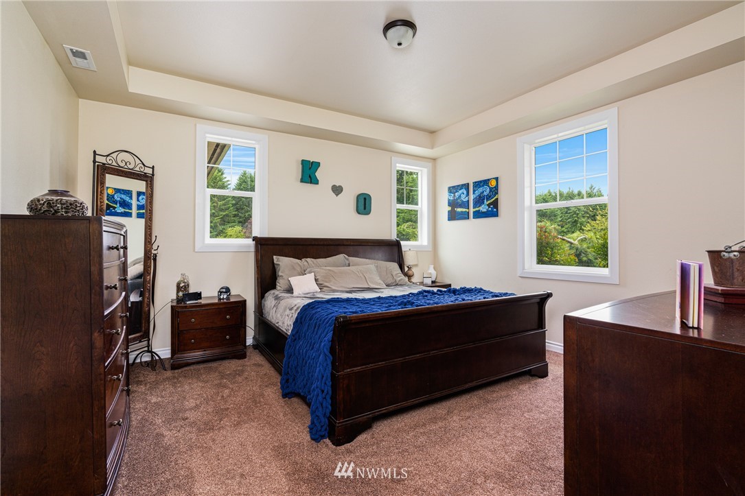 132-12 Pleasant Hill Road Chehalis, WA 98532 - Photo 11 of 25 a bedroom with a bed next to a window