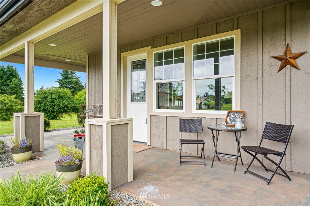 132-12 Pleasant Hill Road Chehalis, WA 98532 - Photo 3 of 25 a view of a chair and table in backyard
