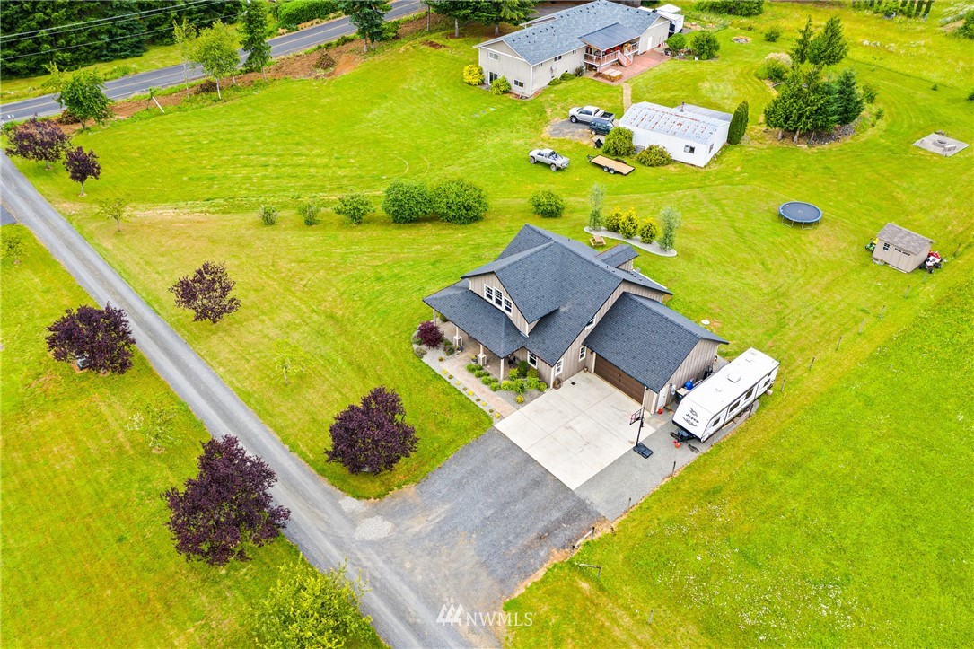 132-12 Pleasant Hill Road Chehalis, WA 98532 - Photo 25 of 25 an aerial view of a house with a swimming pool