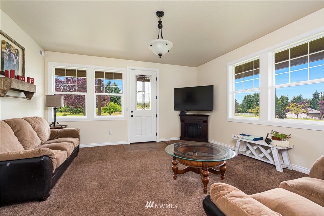 132-12 Pleasant Hill Road Chehalis, WA 98532 - Photo 6 of 25 a living room with furniture fireplace and window