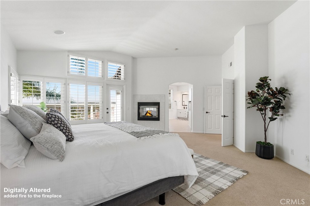 21581 Hummingbird Street Rancho Santa Margarita, CA 92679 - Photo 22 of 56 Primary Bedroom with Plantation Shutters & Fireplace