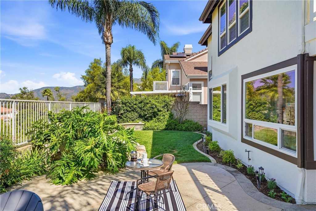 21581 Hummingbird Street Rancho Santa Margarita, CA 92679 - Photo 33 of 56 Backyard with Firepit, Covered Patio & Water Feature