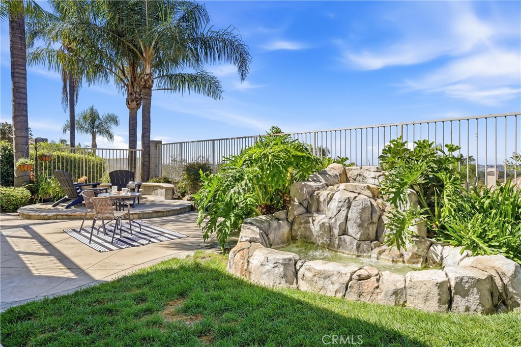 21581 Hummingbird Street Rancho Santa Margarita, CA 92679 - Photo 34 of 56 Backyard with Firepit, Covered Patio & Water Feature