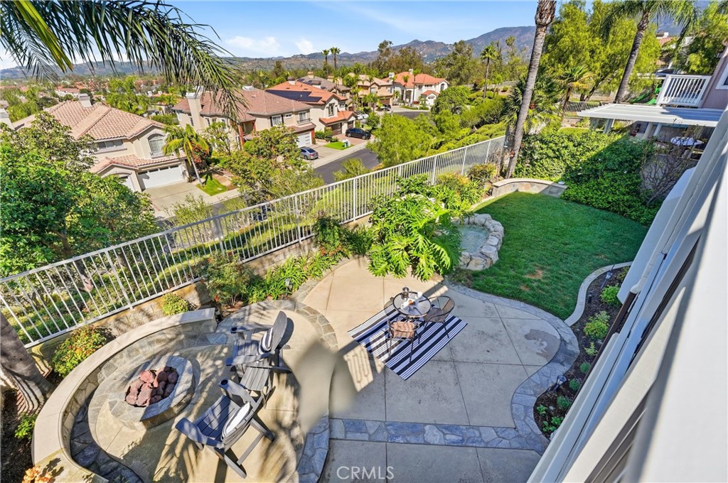 21581 Hummingbird Street Rancho Santa Margarita, CA 92679 - Photo 36 of 56 Backyard with Firepit, Covered Patio & Water Feature