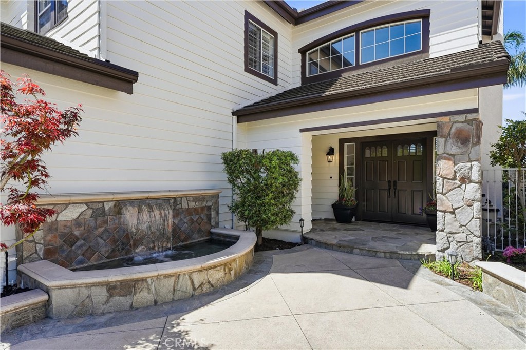 21581 Hummingbird Street Rancho Santa Margarita, CA 92679 - Photo 4 of 56 Inviting Front Porch Entry with Water Feature