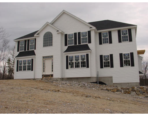 Lot 622 Ryan Farm Road Windham, NH 03087 - Photo 1 of 1 a view of a white house with large windows