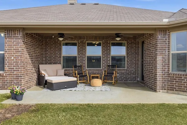 a front view of a house with patio