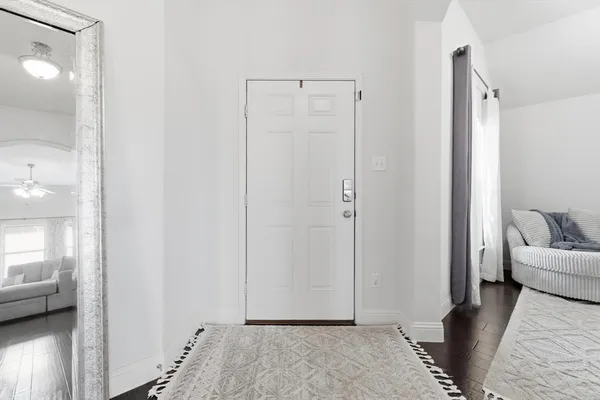 a view of livingroom with furniture and wooden floor