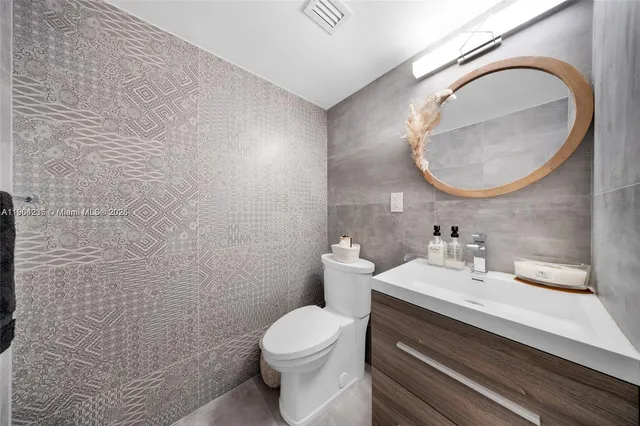 a view of a building with sitting area