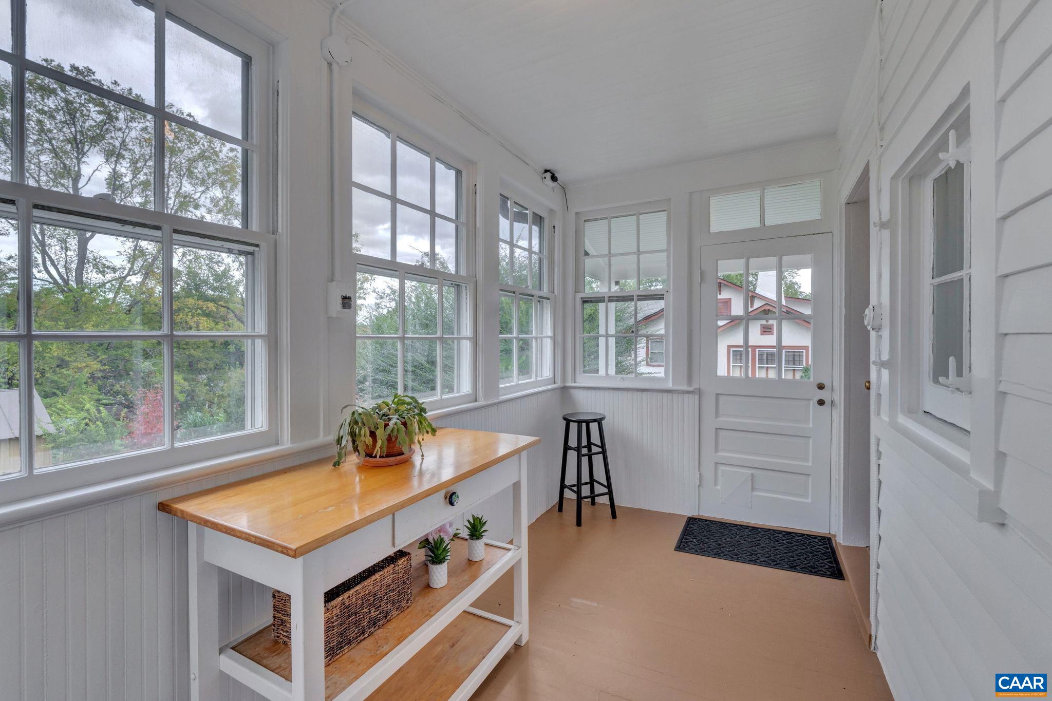945 Locust Avenue Charlottesville, VA 22901 - Photo 16 of 52 a room with furniture and windows