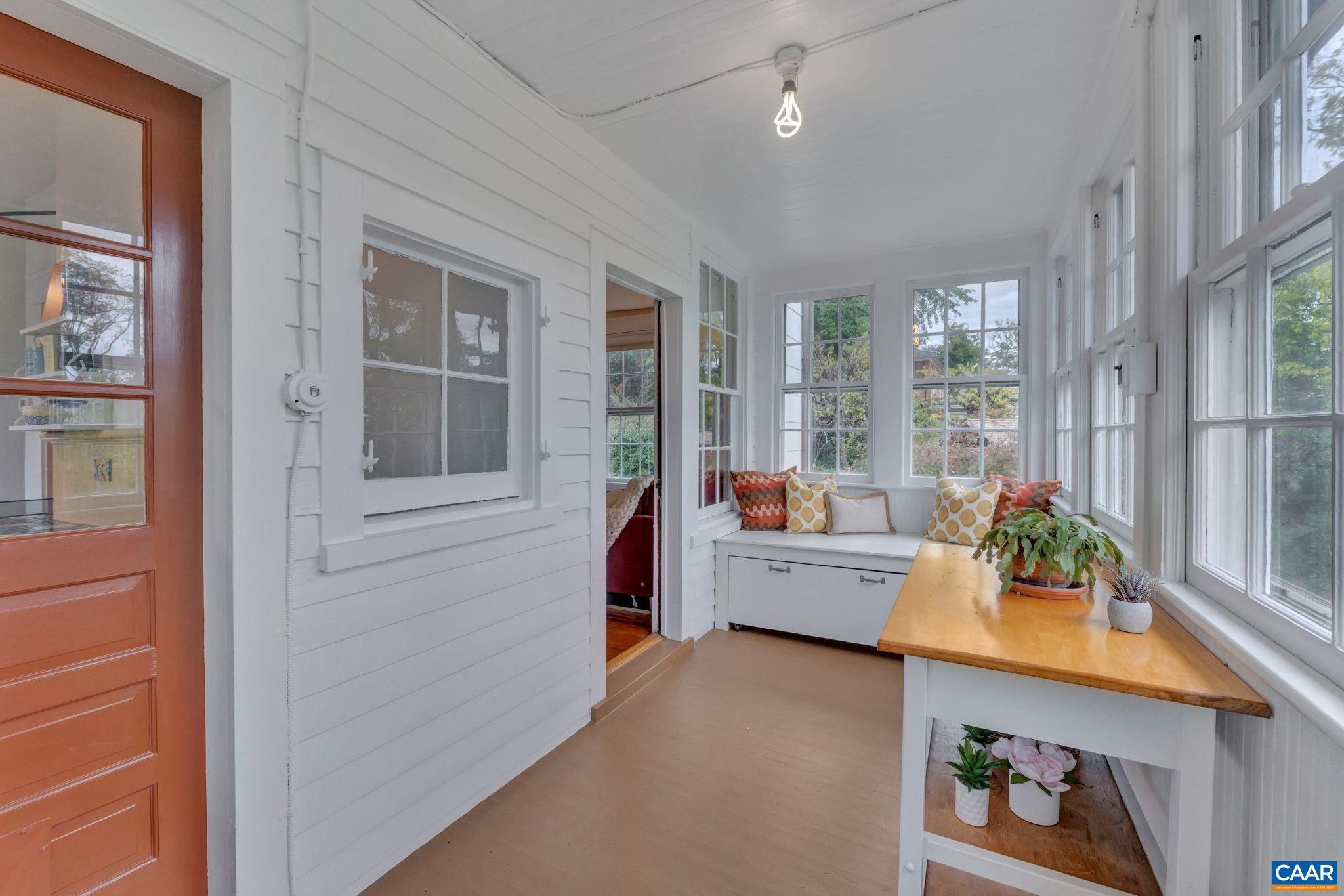 945 Locust Avenue Charlottesville, VA 22901 - Photo 17 of 52 a room with furniture and window