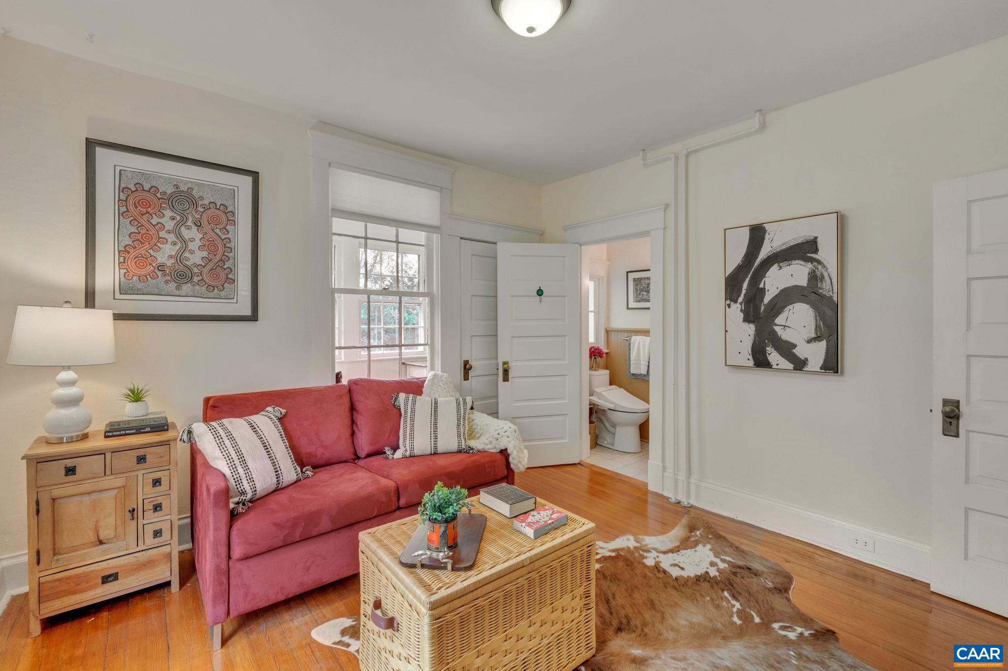 945 Locust Avenue Charlottesville, VA 22901 - Photo 21 of 52 a living room with furniture and wooden floor