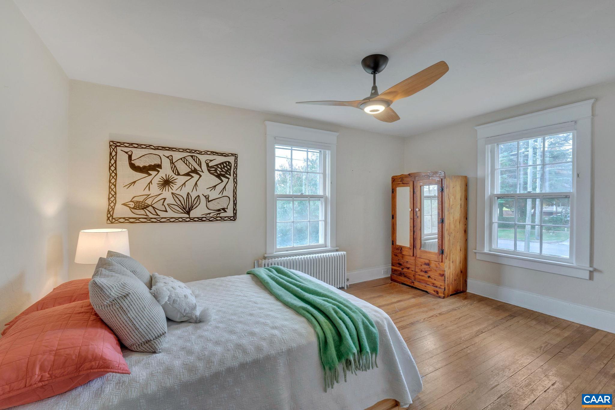 945 Locust Avenue Charlottesville, VA 22901 - Photo 24 of 52 a bedroom with a large bed and a window