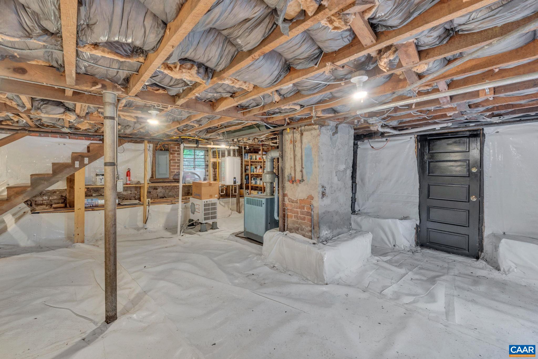 945 Locust Avenue Charlottesville, VA 22901 - Photo 32 of 52 a view of a empty room with wooden walls
