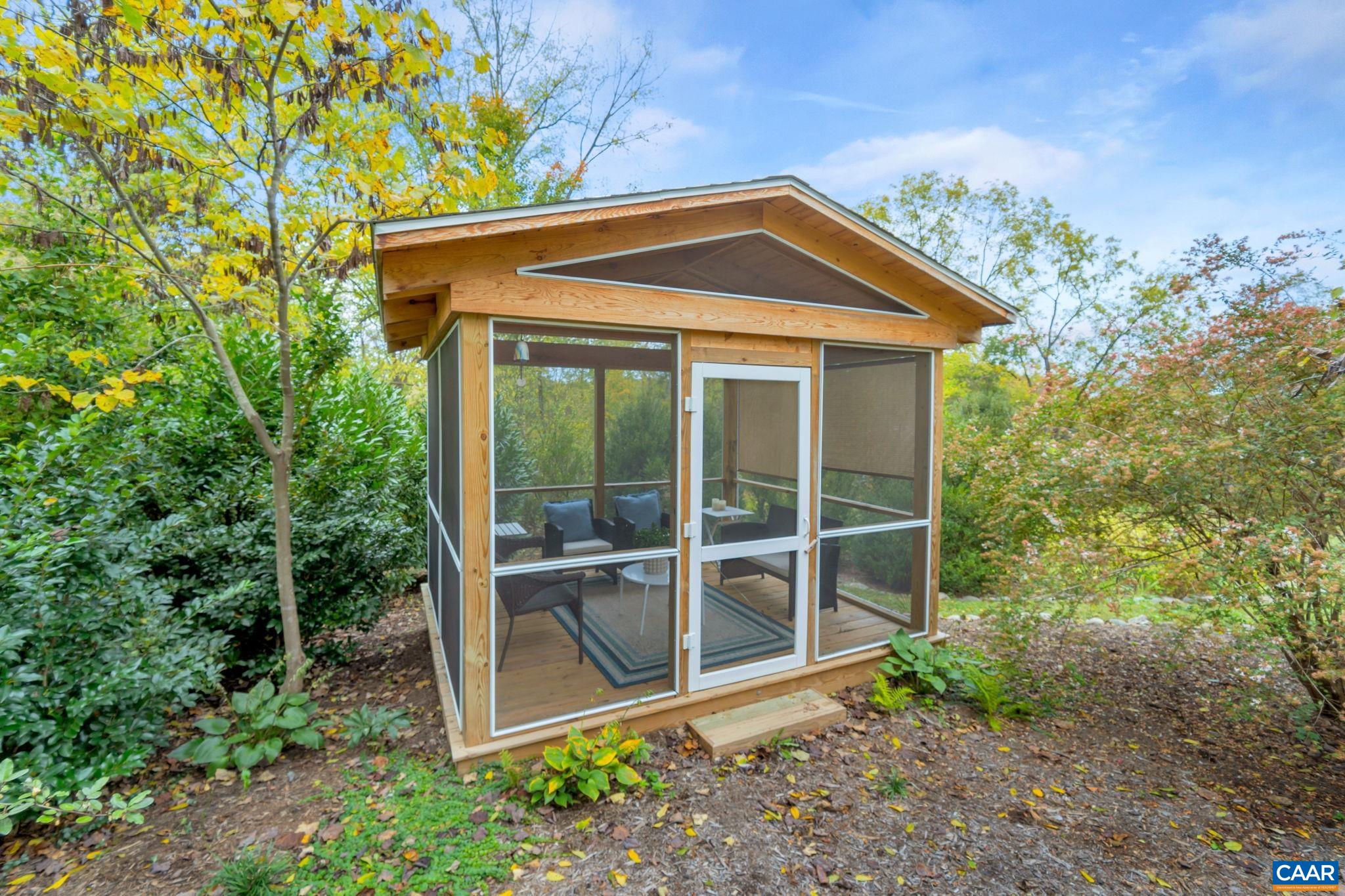 945 Locust Avenue Charlottesville, VA 22901 - Photo 34 of 52 a front view of a house with a yard