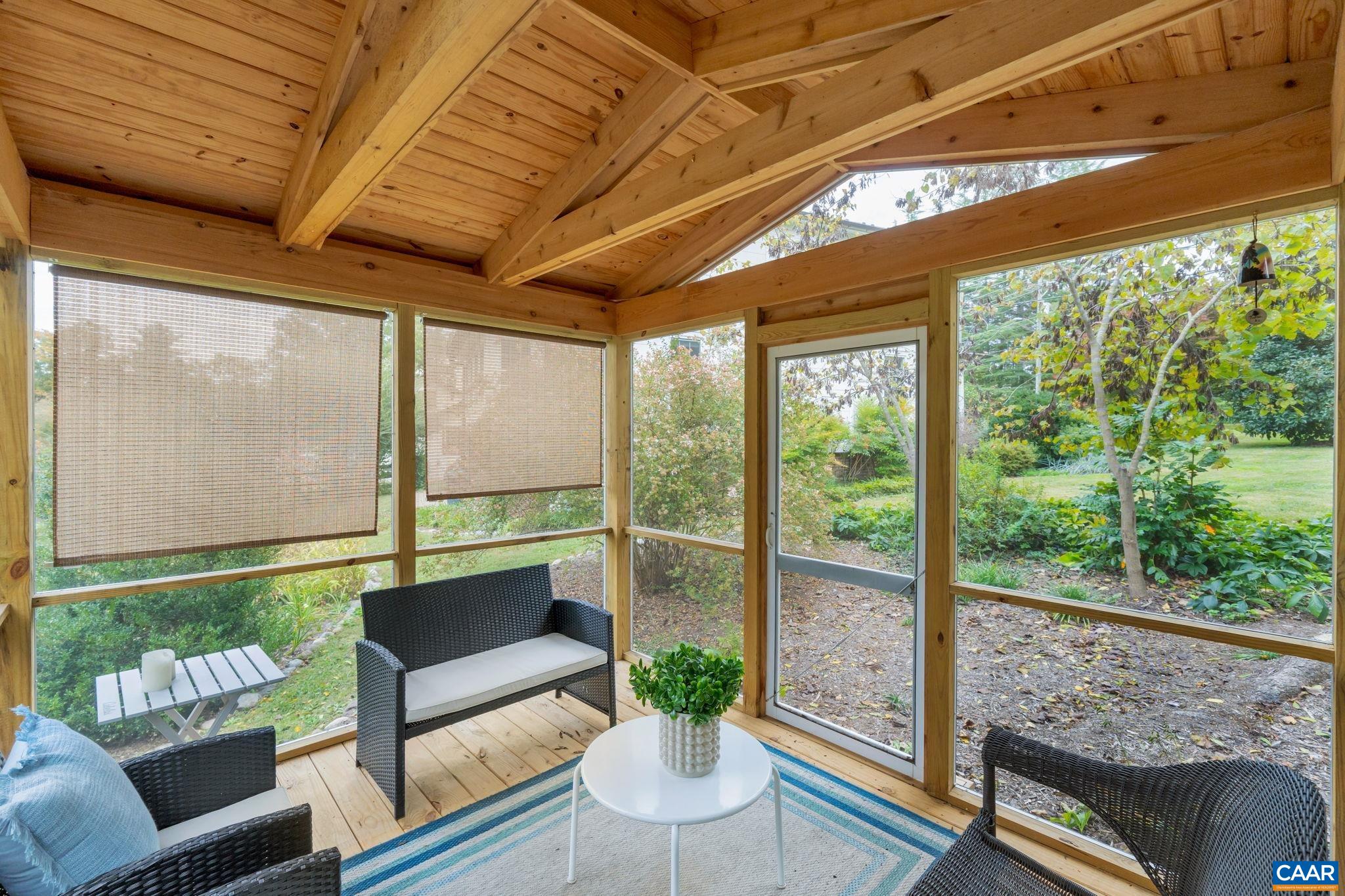 945 Locust Avenue Charlottesville, VA 22901 - Photo 36 of 52 a balcony with furniture and a potted plant
