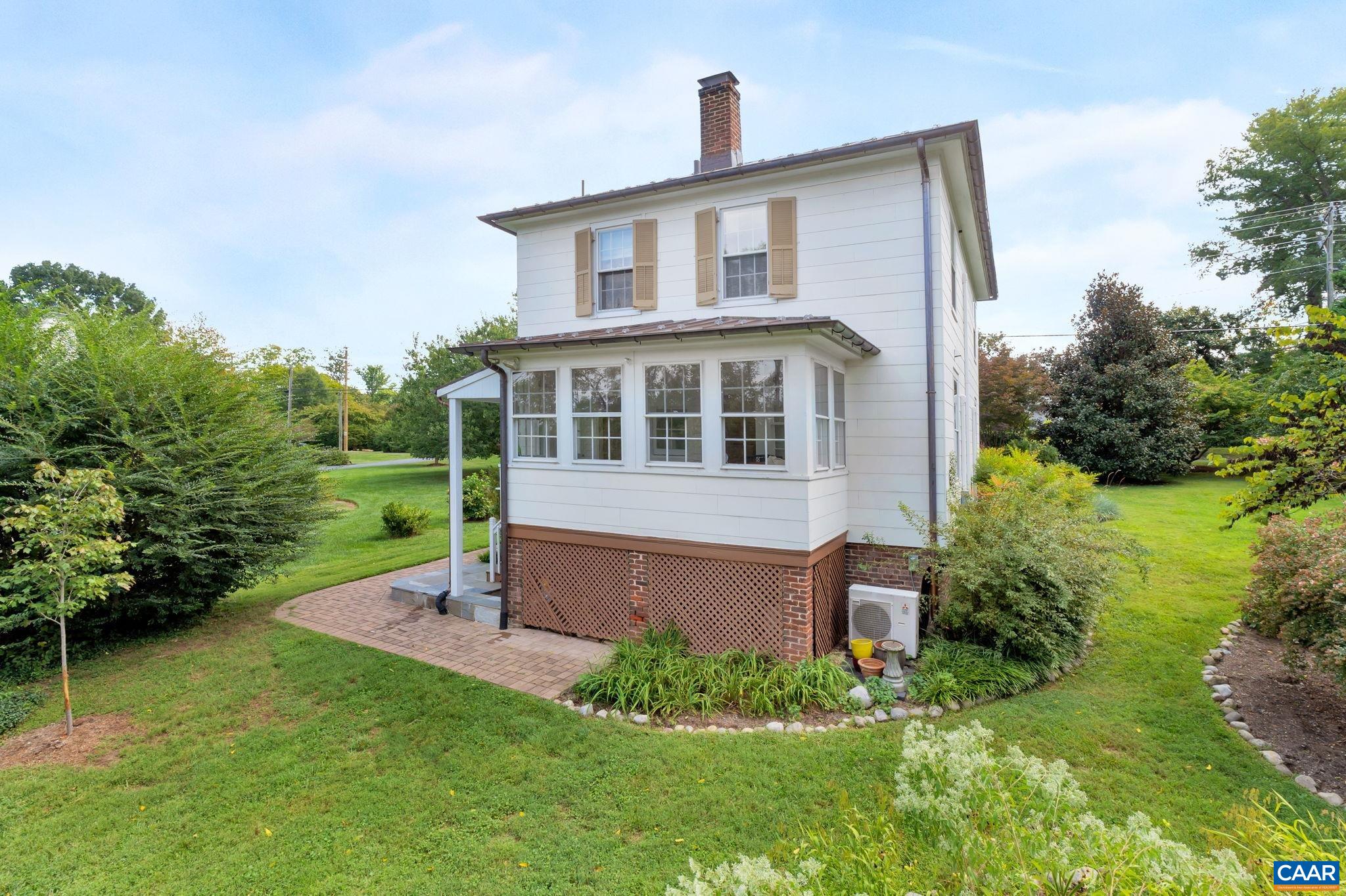 945 Locust Avenue Charlottesville, VA 22901 - Photo 42 of 52 front view of a house with a yard