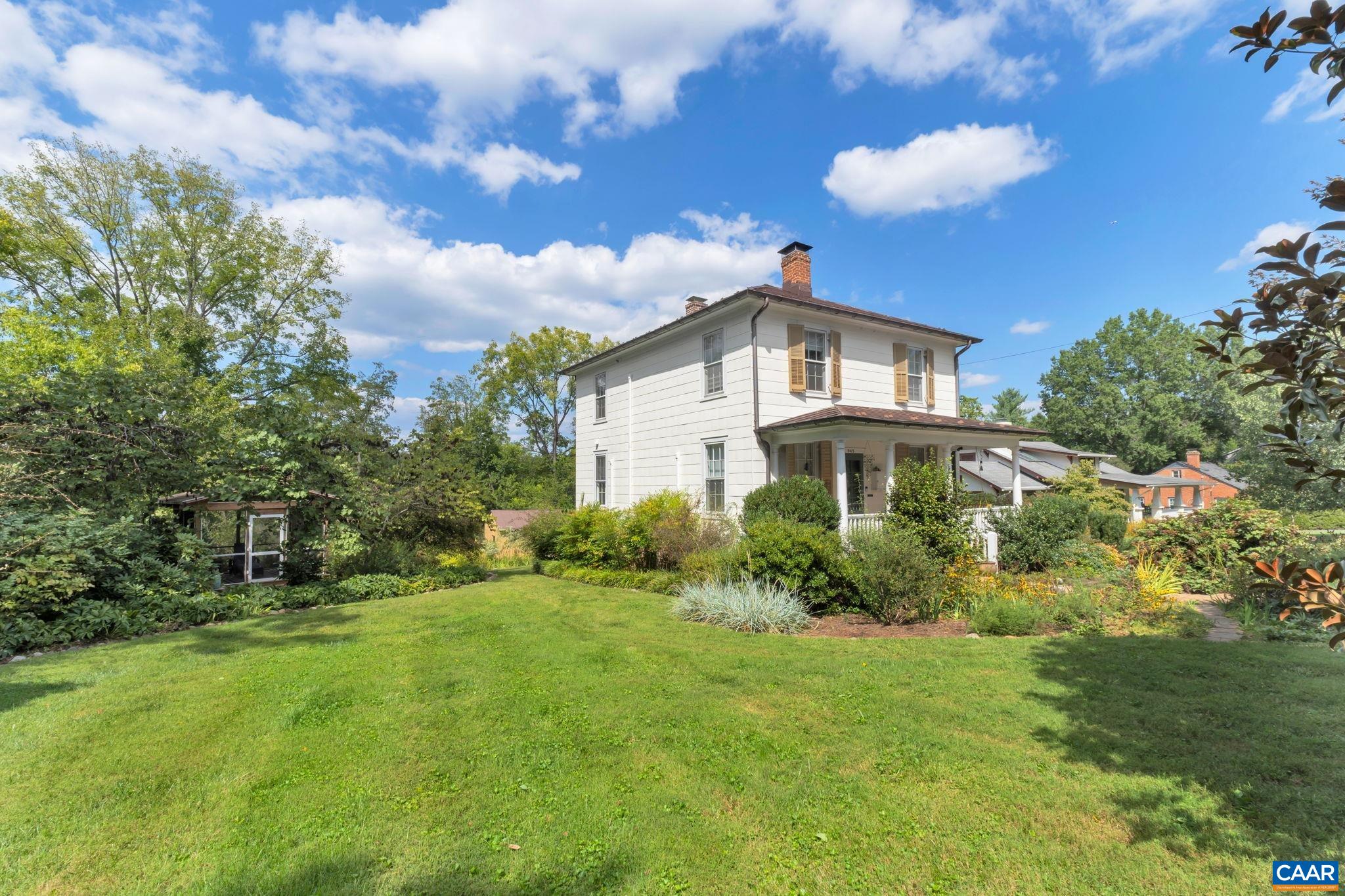 945 Locust Avenue Charlottesville, VA 22901 - Photo 47 of 52 a front view of a house with a yard
