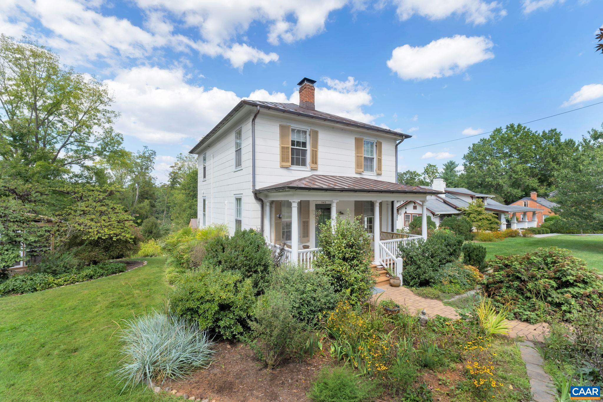 945 Locust Avenue Charlottesville, VA 22901 - Photo 48 of 52 a front view of a house with a yard