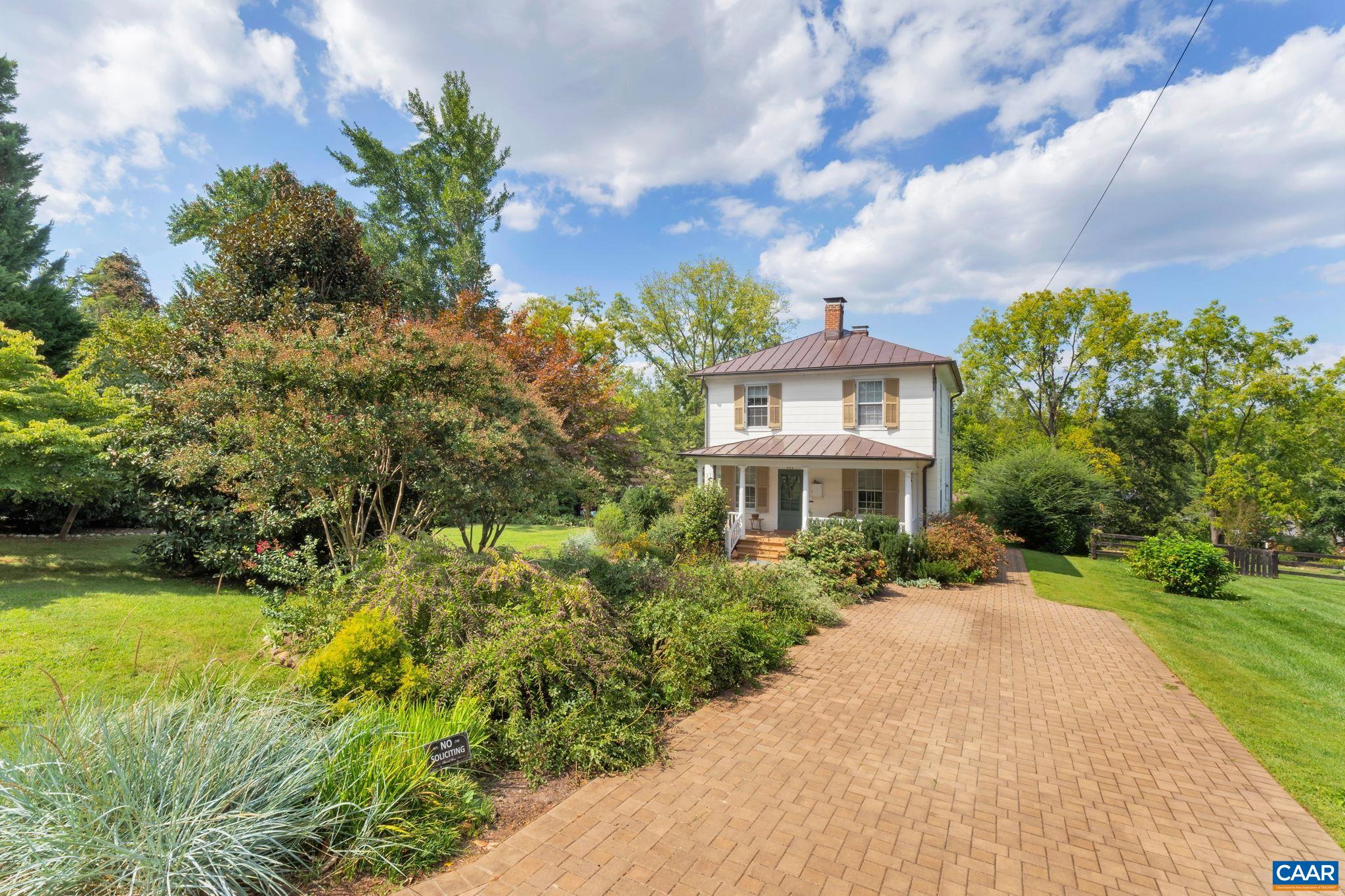 945 Locust Avenue Charlottesville, VA 22901 - Photo 50 of 52 a front view of a house with a yard