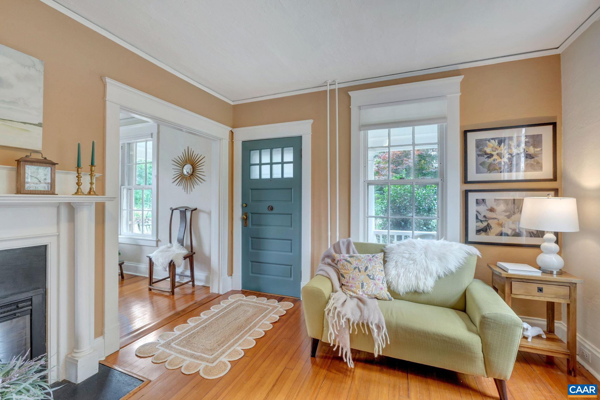 945 Locust Avenue Charlottesville, VA 22901 - Photo 5 of 52 a living room with furniture and a fireplace